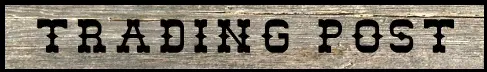 Trading Post" sign on wooden background.